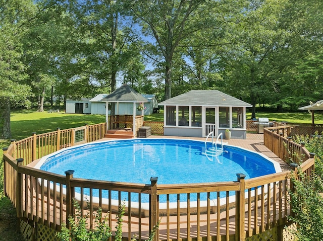 7180 Elrod Rd, Fairview, TN 37062 - swimming pool with a sunroom, a wooden deck, view of scattered trees, and a gazebo