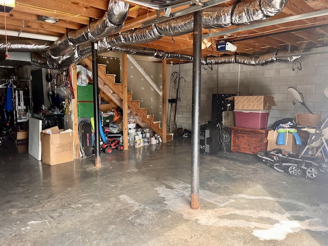4038 Mount Zion Rd, Morrison, TN 37357 - unfinished basement featuring concrete block wall and stairs