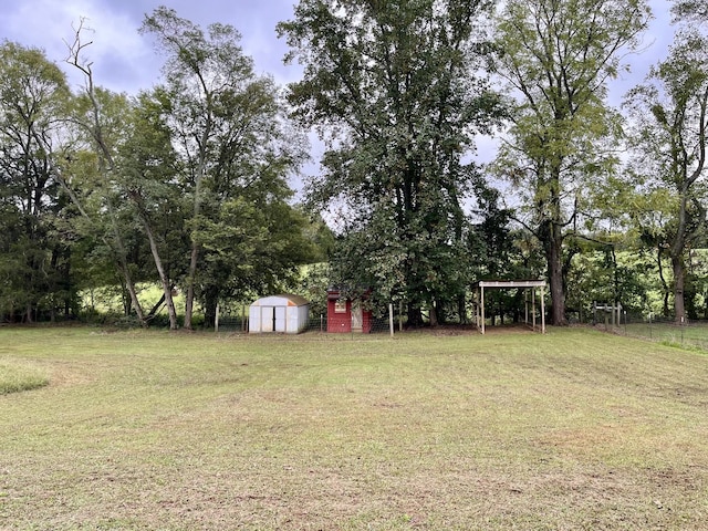 4038 Mount Zion Rd, Morrison, TN 37357 - view of grassy yard with a storage unit