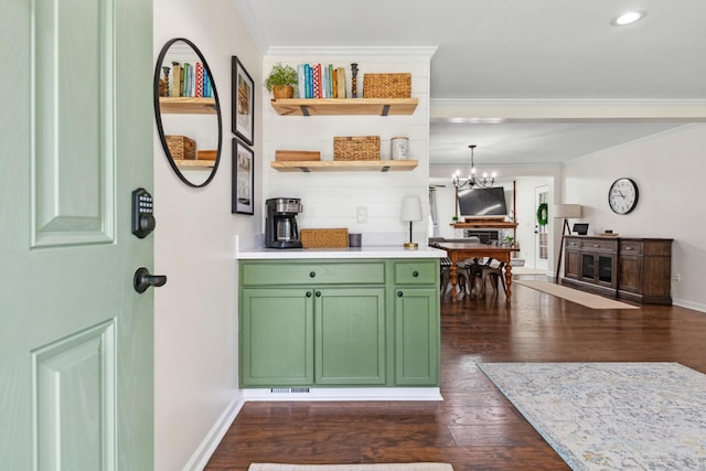1704 Christi Ave, Chapel Hill, TN 37034 - kitchen with green cabinetry, ornamental molding, dark wood-style floors, a chandelier, and light countertops