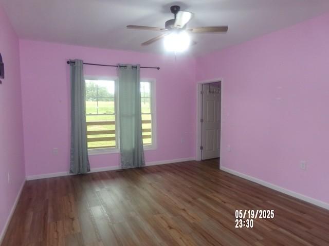 1835 Mosley Ferry Rd, Chapmansboro, TN 37035 - spare room with wood finished floors and a ceiling fan