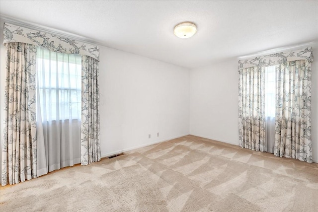 89 Belmar Cir, Manchester, TN 37355 - empty room featuring healthy amount of natural light and carpet