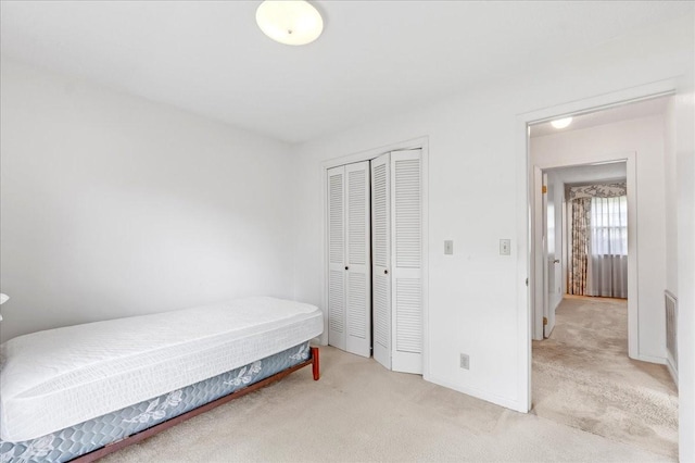 89 Belmar Cir, Manchester, TN 37355 - carpeted bedroom featuring a closet and baseboards
