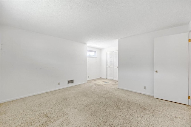 89 Belmar Cir, Manchester, TN 37355 - empty room with a textured ceiling and carpet