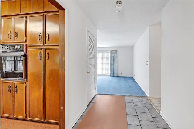 89 Belmar Cir, Manchester, TN 37355 - corridor featuring light colored carpet and baseboards
