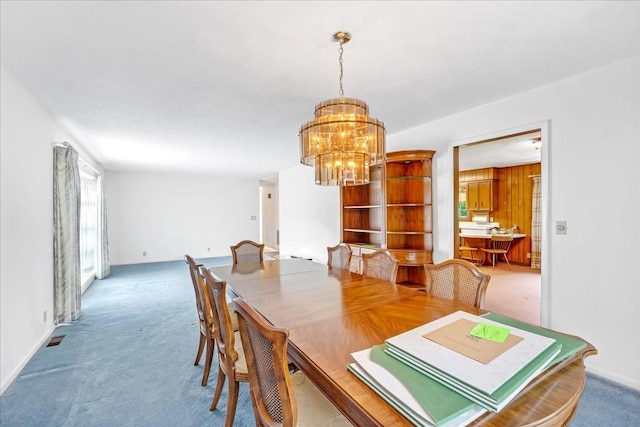 89 Belmar Cir, Manchester, TN 37355 - carpeted dining room featuring a chandelier