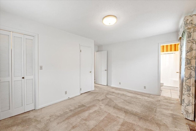 89 Belmar Cir, Manchester, TN 37355 - unfurnished bedroom featuring carpet floors, ensuite bathroom, and a closet