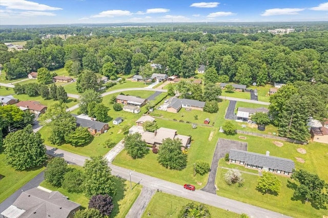 89 Belmar Cir, Manchester, TN 37355 - aerial perspective of suburban area featuring a heavily wooded area