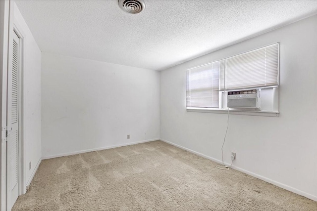 89 Belmar Cir, Manchester, TN 37355 - unfurnished bedroom featuring carpet floors, cooling unit, a textured ceiling, and a closet