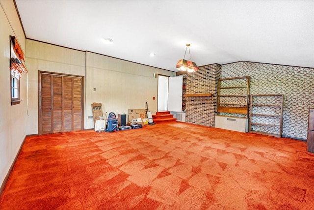 89 Belmar Cir, Manchester, TN 37355 - spare room featuring vaulted ceiling, carpet flooring, and wallpapered walls