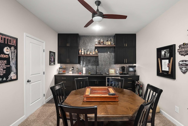 800 Singleton Ln, Brentwood, TN 37027 - carpeted dining space with wet bar, ceiling fan, and beverage cooler