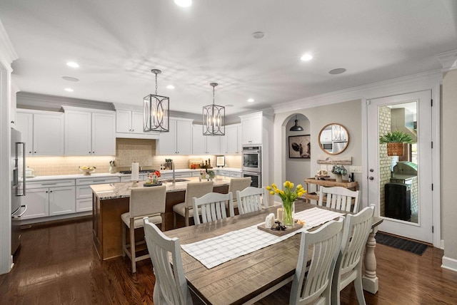 800 Singleton Ln, Brentwood, TN 37027 - dining room with ornamental molding, recessed lighting, dark wood finished floors, and a chandelier