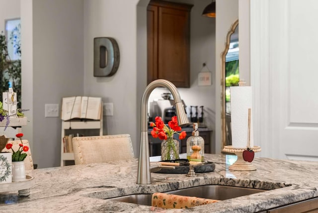 800 Singleton Ln, Brentwood, TN 37027 - kitchen featuring light stone counters and arched walkways