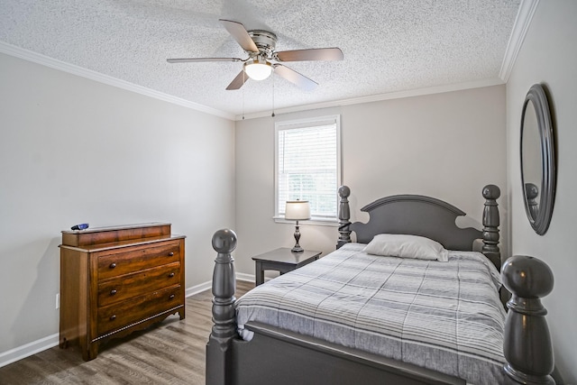 1301 Neelys Bend Rd Unit 14, Madison, TN 37115 - bedroom with wood finished floors, a textured ceiling, a ceiling fan, and crown molding