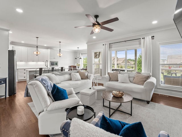 71 Windjammer Ct, Winchester, TN 37398 - living area with ceiling fan, recessed lighting, dark wood-style flooring, and crown molding