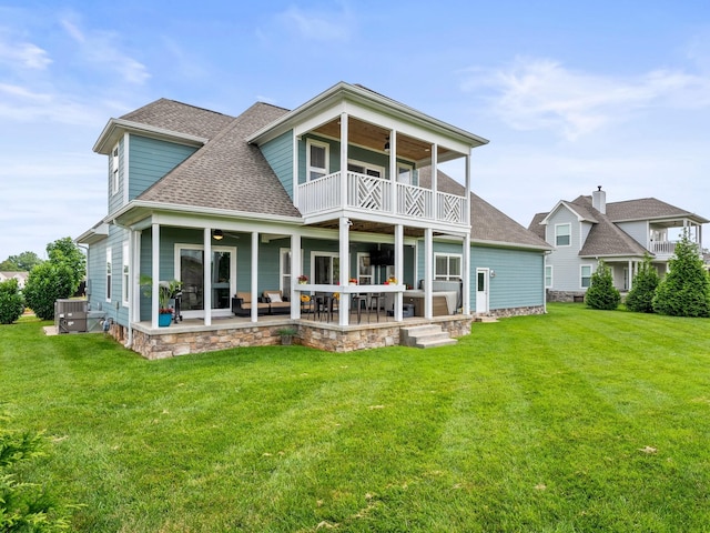 71 Windjammer Ct, Winchester, TN 37398 - back of house with a balcony, ceiling fan, a patio area, and a lawn