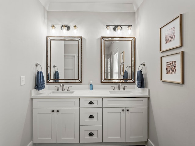 71 Windjammer Ct, Winchester, TN 37398 - bathroom featuring double vanity and baseboards