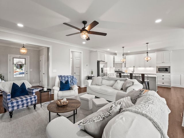 71 Windjammer Ct, Winchester, TN 37398 - living area featuring recessed lighting, dark wood-style floors, a ceiling fan, and ornamental molding