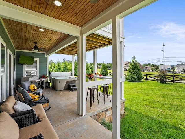 71 Windjammer Ct, Winchester, TN 37398 - view of patio with a ceiling fan, an outdoor bar, and an outdoor living space