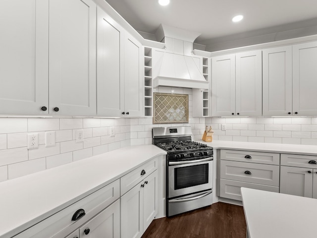 71 Windjammer Ct, Winchester, TN 37398 - kitchen featuring stainless steel gas range oven, open shelves, custom range hood, light countertops, and backsplash