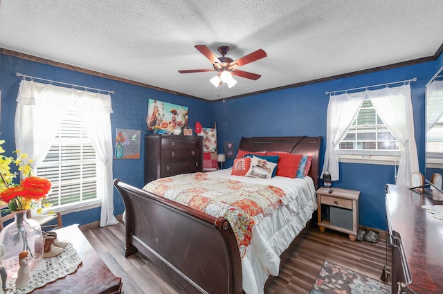 10 Clinton Rd, Humboldt, TN 38343 - bedroom featuring a textured ceiling, wood finished floors, and a ceiling fan