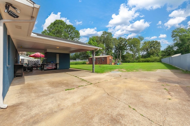 10 Clinton Rd, Humboldt, TN 38343 - view of parking with a shed, driveway, and an attached carport
