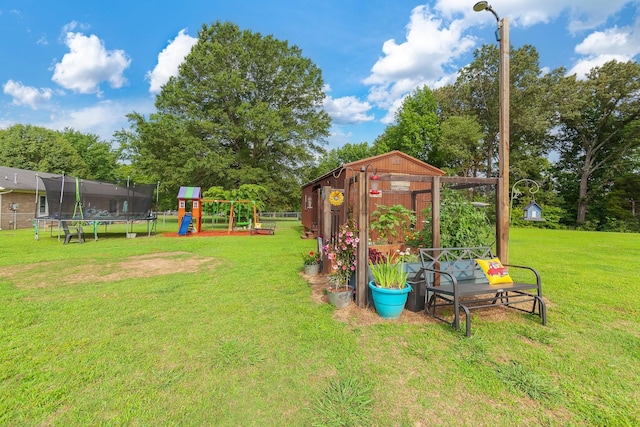 10 Clinton Rd, Humboldt, TN 38343 - view of yard with a trampoline, a playground, and an outbuilding