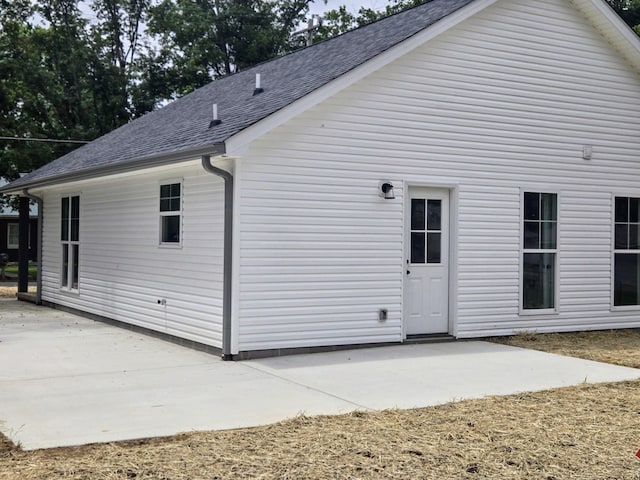 504 1st St, Lawrenceburg, TN 38464 - back of property with a patio area and a shingled roof