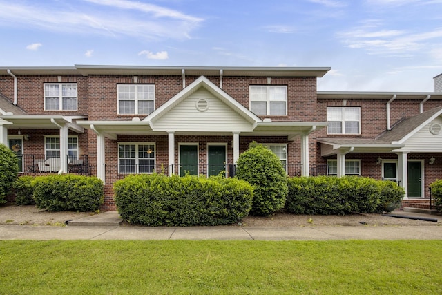 7470 Charlotte Pike Unit 3, Nashville, TN 37209 - view of property featuring a front lawn and brick siding