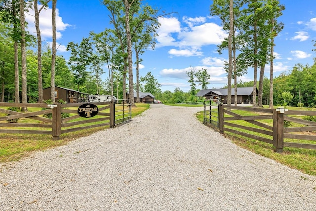634 Cowboy Way, Jamestown, TN 38556 - view of dirt / gravel road featuring a gated entry and a gate