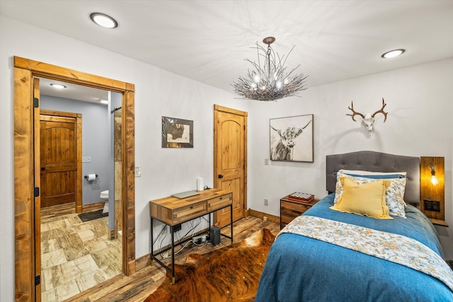 634 Cowboy Way, Jamestown, TN 38556 - bedroom with a chandelier and recessed lighting