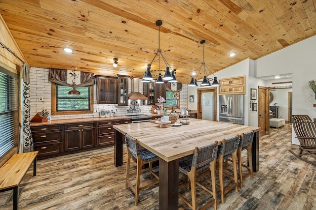 634 Cowboy Way, Jamestown, TN 38556 - kitchen featuring stainless steel refrigerator with ice dispenser, wood finished floors, lofted ceiling, dark brown cabinetry, and wooden ceiling