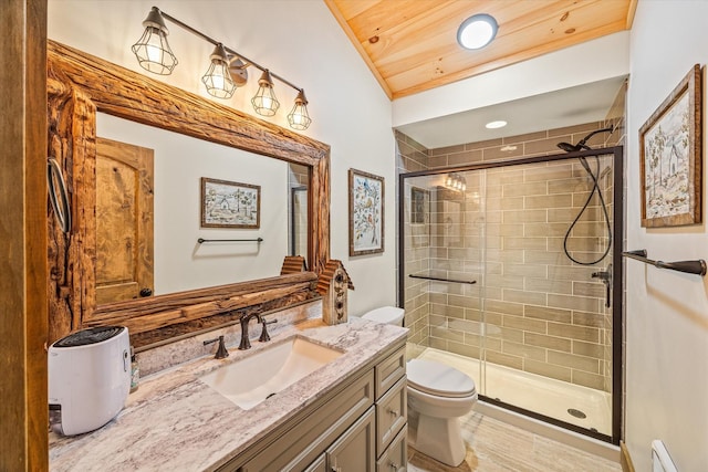 634 Cowboy Way, Jamestown, TN 38556 - full bath with vanity, a stall shower, and a baseboard radiator