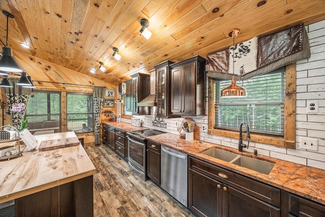 634 Cowboy Way, Jamestown, TN 38556 - kitchen with stainless steel appliances, butcher block countertops, vaulted ceiling, wooden ceiling, and dark brown cabinetry