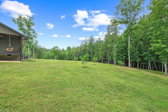 634 Cowboy Way, Jamestown, TN 38556 - view of green lawn featuring a forest view