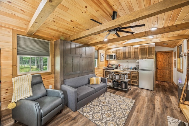 634 Cowboy Way, Jamestown, TN 38556 - living area featuring wood ceiling, dark wood finished floors, wooden walls, and ceiling fan