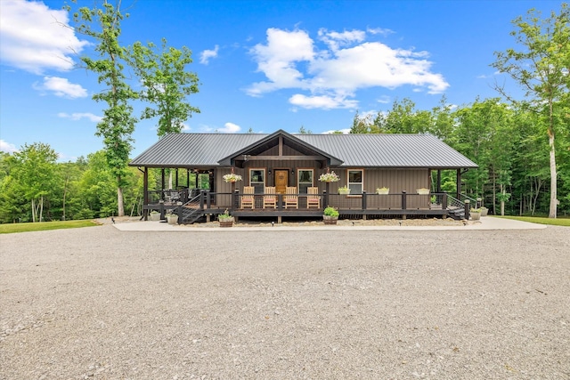 634 Cowboy Way, Jamestown, TN 38556 - chalet / cabin featuring covered porch and a metal roof