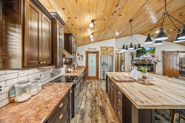634 Cowboy Way, Jamestown, TN 38556 - kitchen with wooden counters, stainless steel appliances, dark wood finished floors, vaulted ceiling, and wooden ceiling