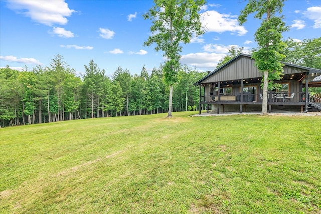 634 Cowboy Way, Jamestown, TN 38556 - view of green lawn featuring a forest view
