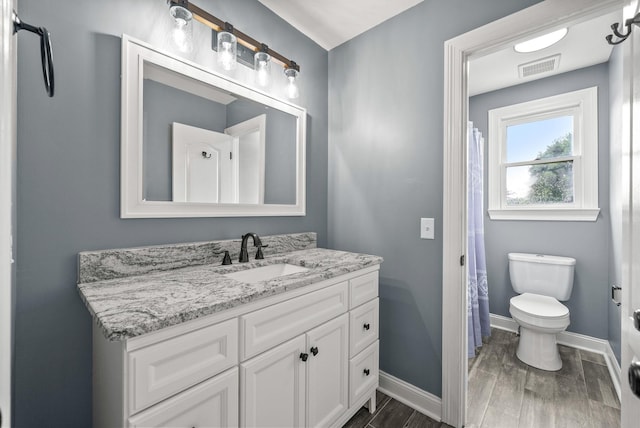 4921 Sango Rd, Clarksville, TN 37043 - bathroom featuring vanity, wood finished floors, and a shower with curtain