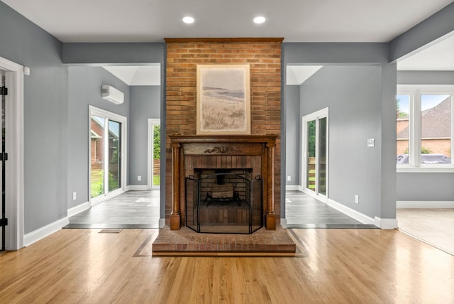 4921 Sango Rd, Clarksville, TN 37043 - unfurnished living room with a fireplace, wood finished floors, and recessed lighting