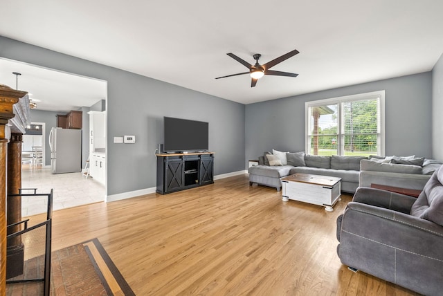 4921 Sango Rd, Clarksville, TN 37043 - living area featuring a ceiling fan and light wood-type flooring