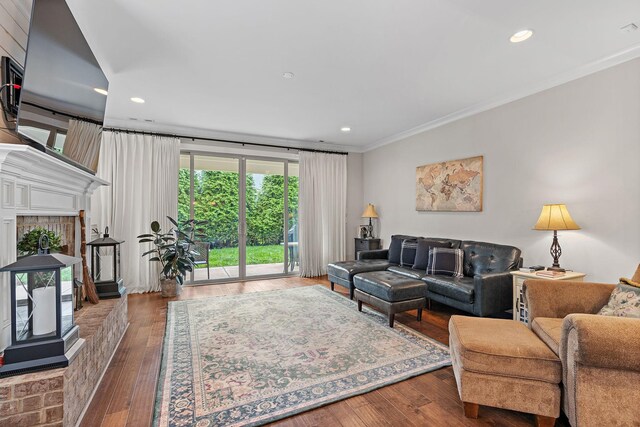 730 Fontwell Ln, Franklin, TN 37064 - living room with ornamental molding, hardwood / wood-style floors, a fireplace, and recessed lighting