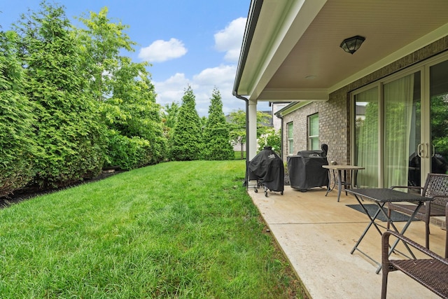 730 Fontwell Ln, Franklin, TN 37064 - view of grassy yard featuring a patio area