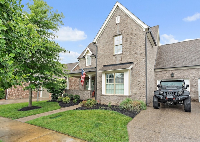 730 Fontwell Ln, Franklin, TN 37064 - view of front of property with driveway, a front lawn, brick siding, a garage, and a shingled roof