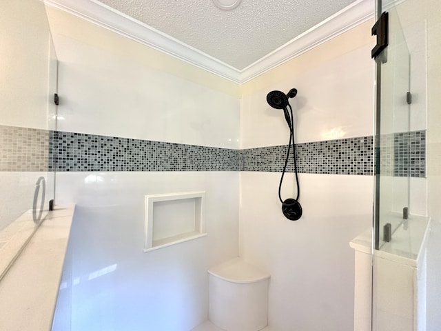 1759 Ardmore Hwy, Taft, TN 38488 - full bath featuring ornamental molding, a shower stall, a textured ceiling, and tile walls
