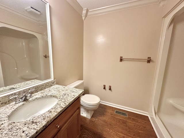 1759 Ardmore Hwy, Taft, TN 38488 - bathroom featuring crown molding, wood finished floors, a shower, vanity, and a textured ceiling