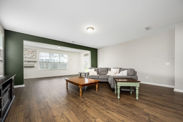 810 Corlew St, Murfreesboro, TN 37130 - living room with dark wood-style flooring and baseboards