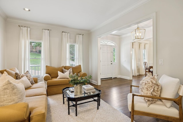 216 Bramerton Ct, Franklin, TN 37069 - living area with a chandelier, dark wood-type flooring, ornamental molding, and recessed lighting