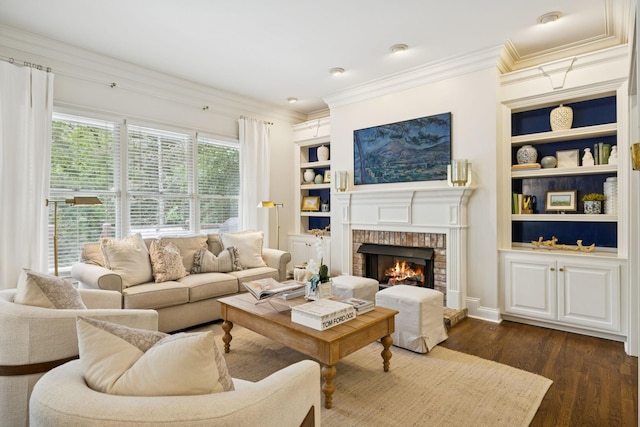 216 Bramerton Ct, Franklin, TN 37069 - living area with built in shelves, dark wood-style flooring, ornamental molding, and a fireplace